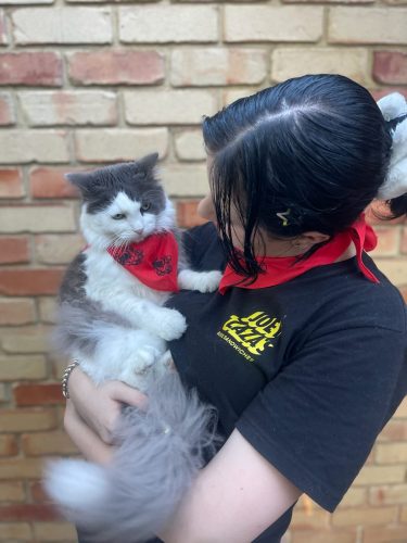 An Alternative Dairy Co. bandana won at Joey Zaza's Coffee Roulette during the 2025 birthday event in Perth CBD, modeled by Joey Zaza's crew Ruby