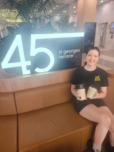 Alternative Dairy Co. Camino Cups won at Joey Zaza's Coffee Roulette during the 2025 birthday event in Perth City, modeled by Joey Zaza's crew Ruby