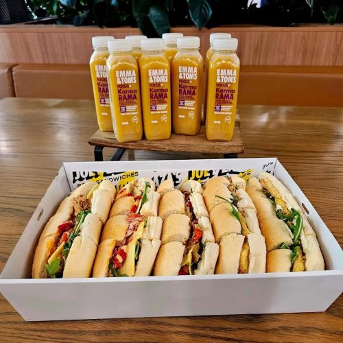 Melbourne Cup Spectators Box: Joey Zaza's light and refreshing lunch catering package for your 2025 Melbourne Cup catering in Perth. Includes savoury sandwich slices and Karma Rama juice.