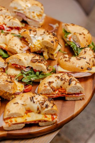 Bagels for sharing in an end of financial year party catering in Perth. Multiple savoury bagel sandwiches per box.
