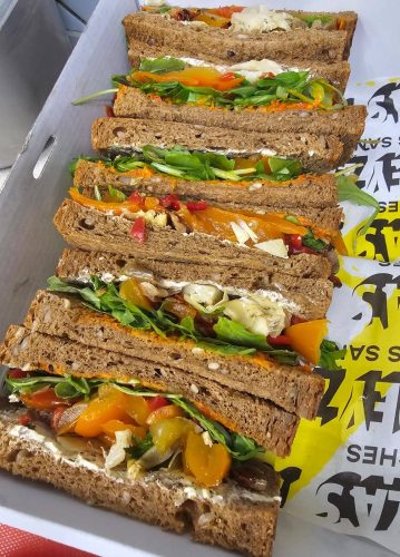 Vegan and vegetarian options for end of financial year catering in Perth. Fresh greens in rye bread.