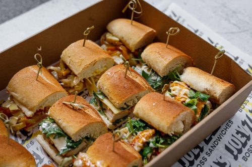 A box full of sandwich roll sliders for an EOFY party in Perth. Platter for sharing.